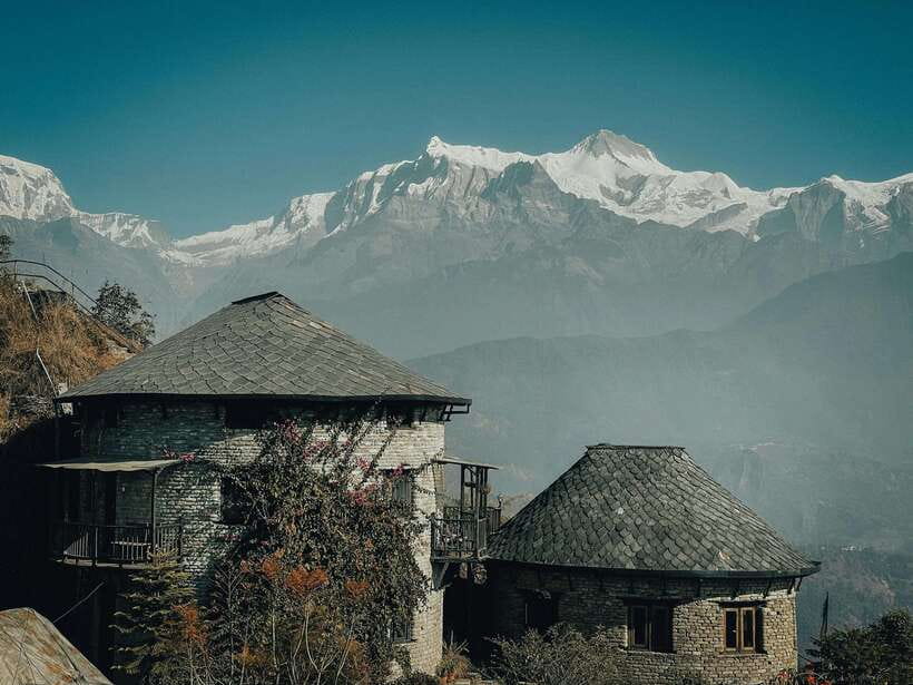 Essence of Nepal: 4-Day Tour Kathmandu, Nagarkot & Pokhara - Day 3 in Pokhara: scenic flight, Phewa Lake area, caves, and mountain museum