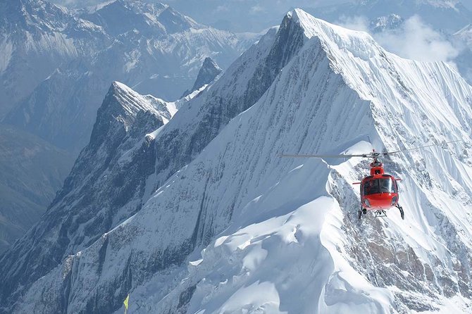 Everest Base Camp Trek with Helicopter Return from Gorakshep to Lukla - Phakding to Namche: Dudh Koshi, prayer flags, and suspension bridges