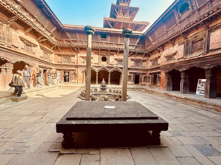 Kathmandu: 7 UNESCO-Listed city sites group day trip - Patan Durbar Square: comparing Hindu and Buddhist influences