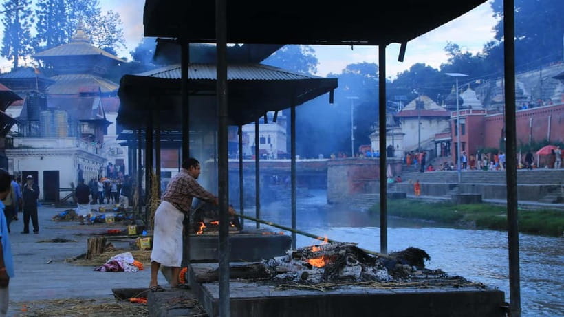 Katmandu: Pashupatinath Open Cremation & Evening Aarati - Walking toward Arya Ghat on the Bagmati River
