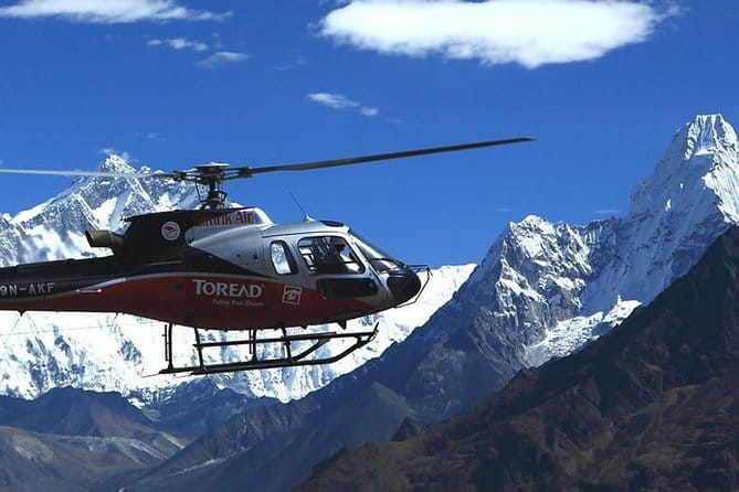 Landing Helicopter at Annapurna base camp from Pokhara tour - When to Go: Clear Skies vs Monsoon Cloud Cover