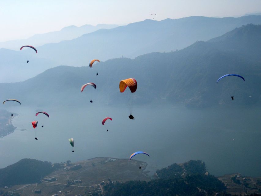 Pokhara: Adventure Paragliding Trip with Photos and Videos - Landing and Going Back to Lakeside: Fast Exit From the Clouds