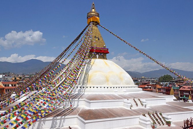 Private Half-Day Tour of Boudhanath and Pashupatinath Temples in Kathmandu - Stop 2, Boudhanath Stupa, Prayer Wheels, and Buddhist Worship